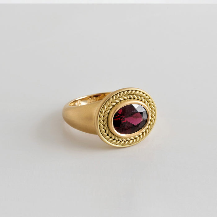 Garnet Oval With Braids Ring